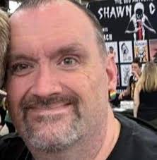 Man with umbrella in Henry County