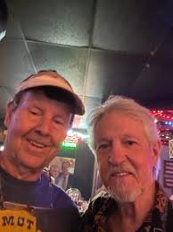 The summer of 1996, maybe 1997 I was skateboarding near the Davenport Bus  Depot. My board slipped and when I went to retrieve it a black Corvette  came around the corner at