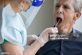 55 Cheek Swab Stock Photos, High-Res Pictures, and Images