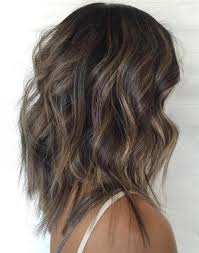 Medium length hair with waves looks perfect for women with older ages. 60 Most Magnetizing Hairstyles For Thick Wavy Hair