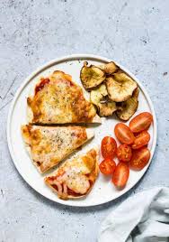 Spread 1tsp of the passata over one side of a pitta bread, then load with toppings of your choice. 5 Mins Air Fryer Pita Bread Pizza Tutorial Vegetarian Recipes From A Pantry
