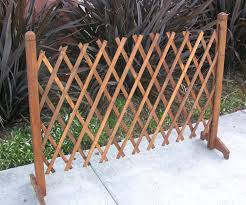 It looks so gorgeous with its checkered or crisscross patterns and will surely style up your beloved backyard. Amazon Com Garden Creations Jb4710 Extendable Instant Fence Outdoor Decorative Fences Garden Outdoor