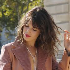 When styling, use low heat on your blow dryer and a smaller round brush angling it vertically for a soft draped appearance. Curtain Bangs Are Viral Tiktok Haircut Trend For Fall