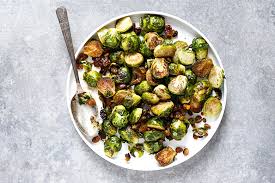 Add half of the brussels sprouts and half of the bacon to the pot. Roasted Brussels Sprouts With Golden Raisins And Pistachios Floating Kitchen