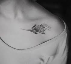flower based tattoos ideas for girls tattoos for women collar bone tattoo shoulder tattoos for women