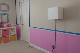 The stripes create an illusion that the room is wider. Kid S Room With Pink Chair Rail Diy Inspired