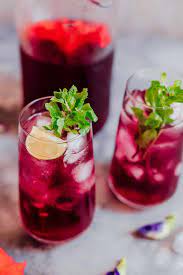 How To Make Hibiscus Tea Benefits And Side Effects Recipe Hibiscus Tea Benefits Iced Tea Recipes Hibiscus Tea