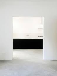 Lessons In Sparseness A Black And White House In Rural Portugal With Echoes Of The Shakers Remodelista House Minimalism Interior Concrete Floors