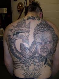 This buddha tattoo covers this man's entire torso, but the only color used is the nice, crisp red, shown off in the lotus, the bridge, and the leaves of the tree. 55 Thai Tattoos Collection
