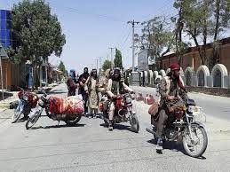 Taliban fighters patrol inside the city of ghazni, southwest of kabul, afghanistan, on thursday. Mumt Dp8qpepcm