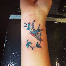 52 Traditional Swallow Tattoo Designs And Meaning Tattoos Swallow Tattoo Tattoo Designs And Meanings