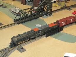 This set features a front locomotive steam engine, a coal tender, a passenger car. Floor Layouts O Gauge Railroading On Line Forum