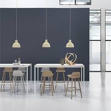 The seat is comfortably cushioned, four footrests ensure comfort for your legs and you and your guests will always have an open seat at the bar. Nerd Bar Stool Comfort And Scandinavian Design Muuto Height 65 Cm With Steel Protection For The Crossbar Green