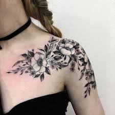 The very best flower tattoo pics. 13 Tattoo Artists Who Capture The Diverse Beauty Of Flowers Bone Tattoos Shoulder Tattoos For Women Tattoos