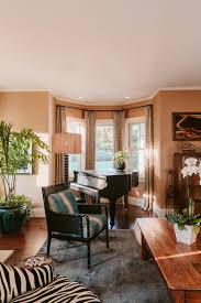 If you do not have enough room for chairs, add a few accent pillows. Eclectic Living Room Includes Bay Window With Piano Hgtv