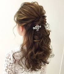 You can also tuck the shorter side behind one ear for a more casual appeal. Half Up Half Down Curly Hair Casual Novocom Top