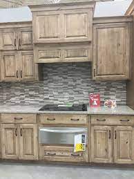 Knotty Pine Kitchen Cabinets Lowes Inspirational Lowes Schuler Cabinetry Knotty Alder Cappucci Custom Kitchen Cabinets Pine Kitchen Cabinets Kitchen Renovation