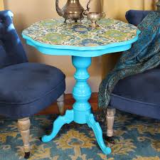 My apartment is one half of a house that's over a hundred years old and contains little gems like a fireplace in every room and gorgeous antique wallpaper. 10 Unique Ways To Update A Table With Decoupage