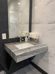We did not find results for: Arizona Tile Our Showroom In Miramar San Diego Ca Has Fantasy Ocean Polished Marble Paired With Tru Marmi Arabescato Polished And Paros Black Hex As The Wall And Backsplash Respectively Come
