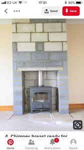 You can build the perfect fire, but it's all for naught if the wood you burn is wet, green or rotted. Building A Fireplace Around A Wood Burning Stove Hearth Com Forums Home
