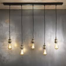 Suspension 5 Douilles En Metal Coloris Noir Et Laiton Murphy Maisons Du Monde Lampe Suspension Luminaire Accessoires Salle De Bain