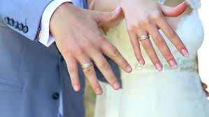 In many countries, engagement rings are placed on the ring finger of the left hand. Shutterstock