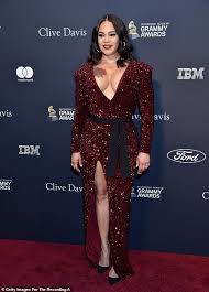 Britain's dan evans made a splash at the 2013 us open when he knocked out kei nishikori in the first round. Faith Evans 46 Shows Off Her Huge Rose Tattoo In Plunging Red Glitter Gown Daily Mail Online