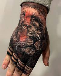 Lion Hand Tattoo Lion Head Tattoos Lion Hand Tattoo Hand Tattoos For Guys
