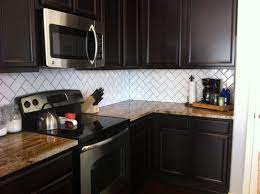 Kitchen countertops kitchen backsplash diy kitchen kitchen and bath kitchen decor kitchen cabinets kitchen appliances subway backsplash kitchens. Perhaps Laughter Brings Clarity Addicted 2 Decorating Backsplash With Dark Cabinets Dark Kitchen Modern Kitchen Tile Backsplash