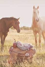 Newborn Baby On Her Mothers Saddle Please Note This Is A Composite Image Baby Was Not Near The Horses At Al Baby Pictures Baby Photoshoot Newborn Pictures
