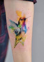 Watercolor Bird Tattoo Inkstylemag Watercolor Bird Tattoo Hummingbird Tattoo Beautiful Tattoos