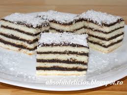 Prajitura binecunoscuta din copilarie acum in forma rotunda pudrata cu zahar si nuca de cocos. Absolut Delicios Prajitura Cu Foi Si Crema De Ciocolata