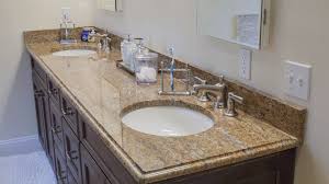 Beautiful bathroom features full height subway tile backsplash framing a gray vanity sink topped with jet mist honed granite countertop framing sink and satin nickel faucet under a black beveled vanity mirror. Granite Bathroom Design Ideas Best Designs In 2021 Marble Com