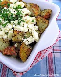 Roasted Greek Potatoes With Feta Cheese And Lemon Greek Potatoes Greek Recipes Food Dishes