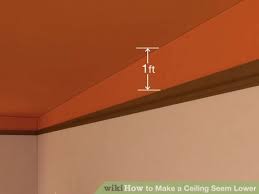 How To Make A Ceiling Seem Lower Ceiling High Ceiling Home Living Room
