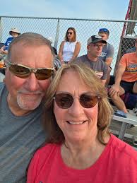 Racing cars with dirt track damage