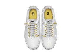 Black Air Forces With White Laces Peep The Yellow Laces On Nike S Latest Air Force 1 Silhouette Nike Air Force Nike Air Nike Air Max For Women