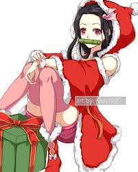 2 inch hard enamel pin featuring nezuko from the anime demon slayer popping out of a christmas present box. Artstation Nezuko Christmas Ver Juuichi Roku