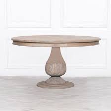 A round table works in small dining rooms sharing space with the kitchen. Wooden Rustic Reclaimed 150cm Acorn Pedestal Round Dining Table Light Finish