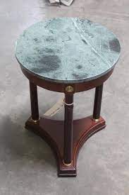 Take this one for example: The Bombay Company Side Table Property Room
