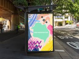 A beautiful bus stop ad mockup standing on an interesting downtown street, which people cross on the way to work. Outdoor Bus Stop Advertisement Vertical Billboard Poster Mockup Free Mockup