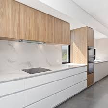 This kitchen designer used a light grey shaker cabinet design for a subtle pop of contrast against the shimmery white herringbone backsplash. China Modern Style Wood Grain Laminates Kitchen Cabinets Practical Kitchen Design Ideas China Kitchen Cabinets Kitchen Products