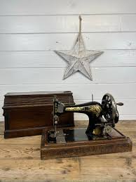 Image result for singer 28k