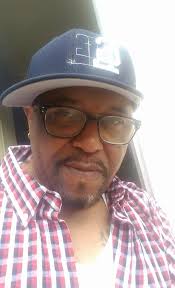 Should I use the real name and location of a well-known facility in my  dramedy pilot or use a fictional one?