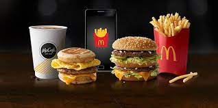 Mccafe Drink In Paper Cup Sausage Egg Cheese Mcgriddles Smartphone And Big Mac Mcdonalds Gift Card Free Mcdonalds Burger King Gift Card