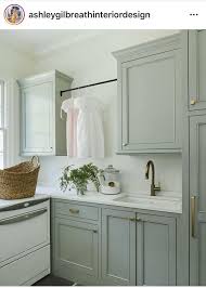 Farrow & ball oval room blue via dyer grimes architect. 6 Gorgeous Light Blue Grey Paint Colors For Calm Interiors Hello Lovely Laundry Room Inspiration Blue Gray Kitchen Cabinets Grey Blue Kitchen