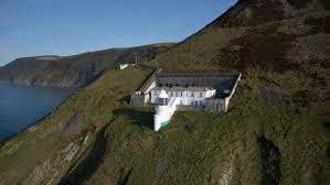 National trust) this regency house and estate in barnstaple was held by the chichester family for more than five centuries and is an unexpected jewel on the edge of exmoor. The Exterior Of The Lighthouse Keepers Cottage Lynton Devon Holiday Cottage Cottage Lighthouse Keeper