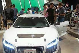 In Iron Man 3 Tony Stark Drives The New Electric Supercar The Audi R8 E Tron Iron Man 3 Audi Usa Audi