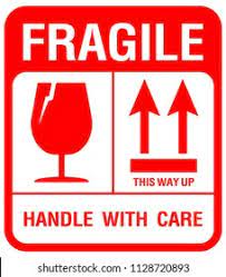 Fragile handle with care sticker on box being sent by us postal service priority 2 day mail cut out. Fragile Sticker Print Promotions