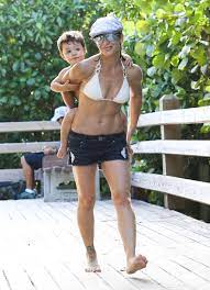 Maybe you would like to learn more about one of these? Jillian Michaels Carried Her Son Phoenix Rhoades Jillian Michaels Brings Her Bikinis And Babies To The Beach Popsugar Celebrity Photo 14